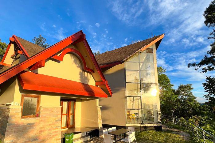 A-frame villa with its glass gable