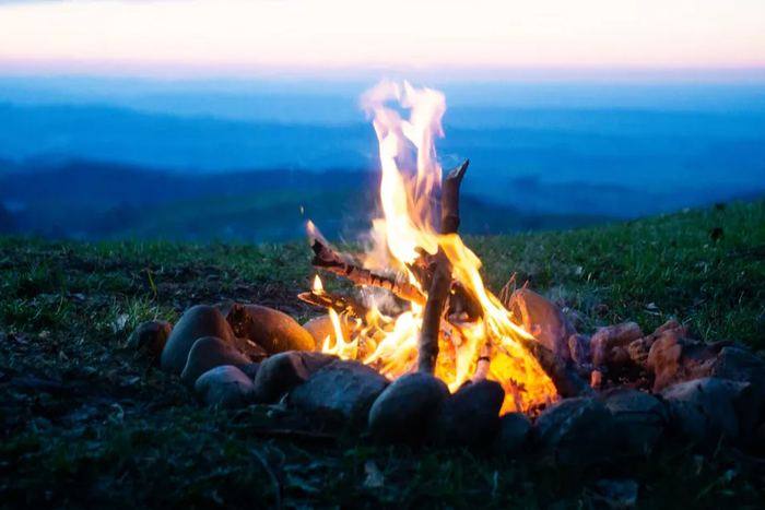 Campfire above the valley