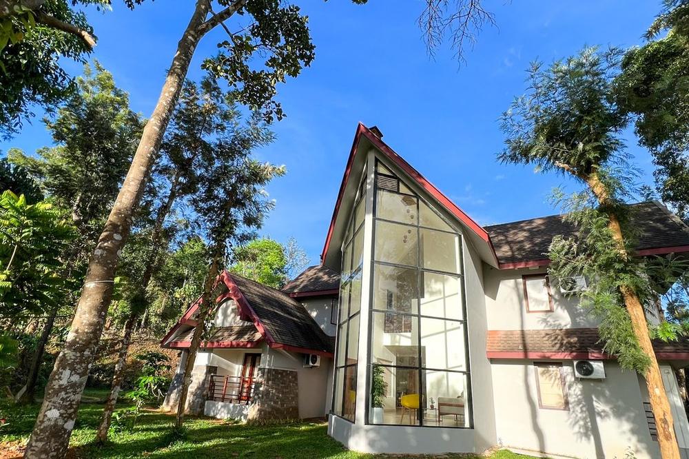 Villa among the trees, seen from below